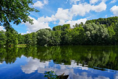 Paddelteich in Bad Wnneberg. Idyllic landscape at the lake with green nature.
