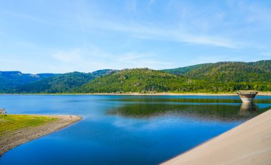 View of the Innerstetalsperre with the surrounding nature. Landscape at the Innerste reservoir. Lake in the Harz.