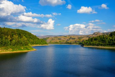 Soesetalsperre near Osterode am Harz. View of the reservoir with the surrounding idyllic nature. Landscape at the lake in the Harz National Park.