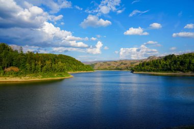 Soesetalsperre near Osterode am Harz. View of the reservoir with the surrounding idyllic nature. Landscape at the lake in the Harz National Park.