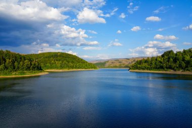 Soesetalsperre near Osterode am Harz. View of the reservoir with the surrounding idyllic nature. Landscape at the lake in the Harz National Park.