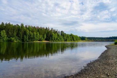 Landscape at the Unterer Haus-Herzberger Teich. Nature at the lake near Clausthal-Zellerfeld in the Harz National Park. Former mining pond.