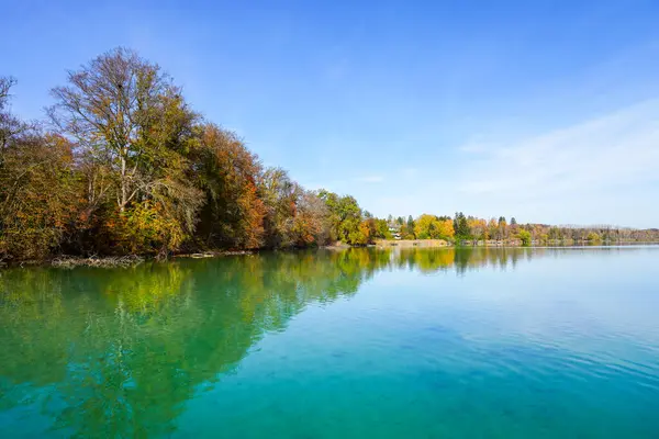 stock image Idyllic autumn landscape by the lake.