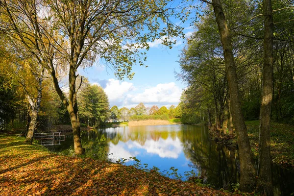 stock image Ostheim natural bathing lake near Malsfeld. Idyllic landscape by the lake in autumn.