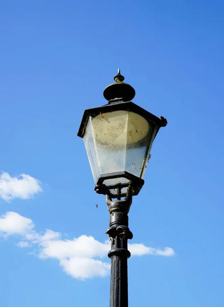 Old Black Metal Street Lamp Blue Sky Clouds Background — Stock Photo, Image