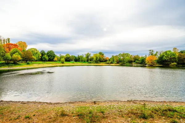 stock image Dietenbachsee near Freiburg im Breisgau with the surrounding nature. Autumn landscape by the lake.