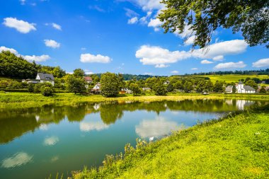 Reservoir on the dam wall at Diemelsee and the surrounding landscape. Nature at the Diemel Dam in the Sauerland.