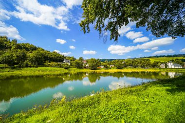Reservoir on the dam wall at Diemelsee and the surrounding landscape. Nature at the Diemel Dam in the Sauerland.