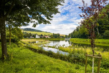Reservoir on the dam wall at Diemelsee and the surrounding landscape. Nature at the Diemel Dam in the Sauerland.