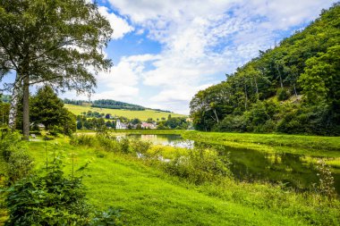 Reservoir on the dam wall at Diemelsee and the surrounding landscape. Nature at the Diemel Dam in the Sauerland.