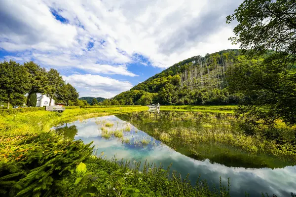 Reservoir on the dam wall at Diemelsee and the surrounding landscape. Nature at the Diemel Dam in the Sauerland.