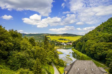 Dam wall at Diemelsee and the surrounding landscape. Diemel Dam in Sauerland. Historical building for water supply.