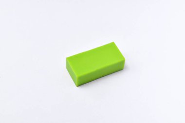 Green eraser isolated on white background