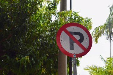 Road sign of the circular shape. No parking
