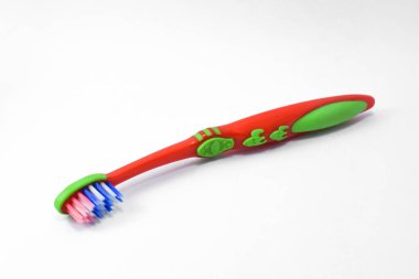 Kids colorful toothbrush isolated on white background