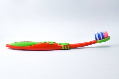 Kids colorful toothbrush isolated on white background