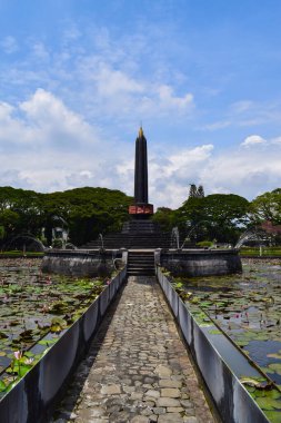 Malang, 07 Desember 2022 - View of Malang Tugu Square with beautiful garden Lotus Flower park is located in front of City Hall (Balai Kota Malang).
