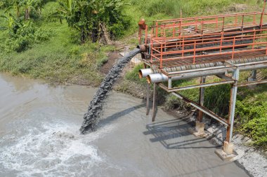 Disposal of Lapindo mud water into the Porong river, East Java