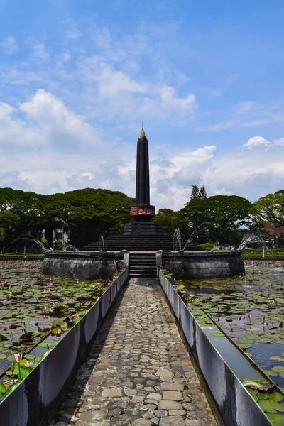 Malang, 07 Desember 2022 - View of Malang Tugu Square with beautiful garden Lotus Flower park is located in front of City Hall (Balai Kota Malang).