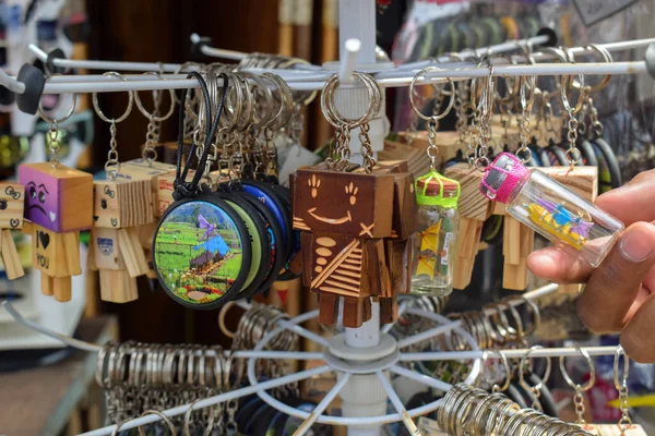 Danbo wooden dolls are sold as souvenirs for tourists in Malang