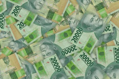 Portrait from Indonesian 20000 Rupiah 2016 Banknotes. Pile of Indonesian rupiah banknotes series. IDR 20.000