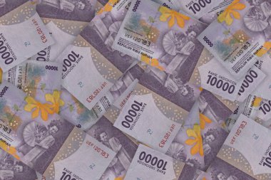 Indonesian rupiah banknotes series with the value of ten thousand rupiah IDR 10.000 issued 2016, Indonesian rupiah for background