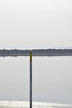 Sidoarjo, 29 October 2022 : Mud level meter in the Lapindo hot mudflow 