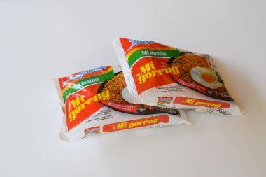 Pasuruan, Indonesia - November 3, 2022 : Indomie, indonesian favourite fried instant noodle, isolated on white background.