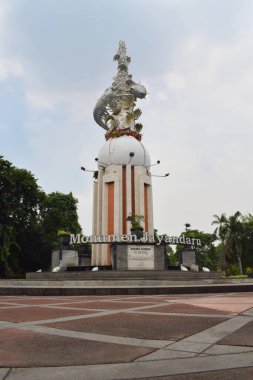 Sidoarjo, Indonesia - November 8, 2022 : Jayundara Monument located in the town square of Sidoarjo. Sculpture in the form of shrimp and milkfish.
