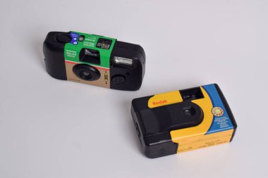 Pasuruan - February 20, 2024 : Disposable Film Camera Fujifilm and Kodak isolated on white background clipart