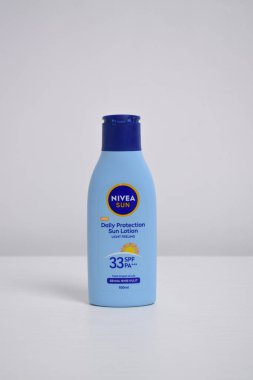 Pasuruan - February 19, 2024 : Nivea daily protection sun lotion isolated on white background. Nivea is a German personal care brand that specializes in skin- and body-care products clipart
