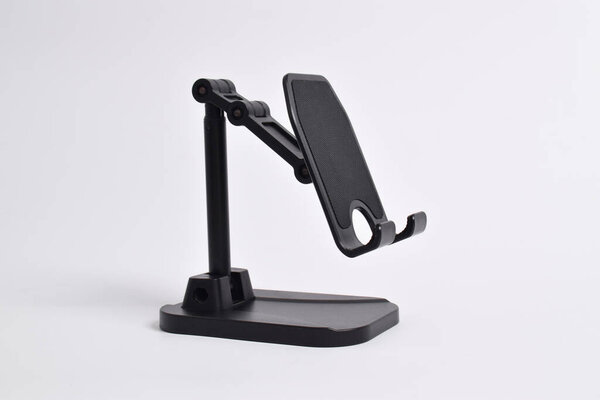 Phone holder stand that can be adjusted to height angle isolated on white background. holder for phone, phone stand, mount, universal