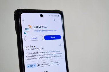 Pasuruan, Indonesia - June 08, 2024 : BSI Mobile app in Google Play Store. Bank Syariah Indonesia application in Google playstore isolated on white background clipart