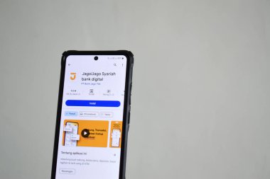 Pasuruan, Endonezya - Haziran 08, 2024: Jago Syariah Digital Bank App in Google Play Store. Google oyun dükkanındaki akıllı telefon uygulaması beyaz arkaplanda izole edildi
