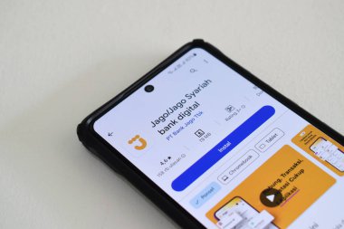 Pasuruan, Endonezya - Haziran 08, 2024: Jago Syariah Digital Bank App in Google Play Store. Google oyun dükkanındaki akıllı telefon uygulaması beyaz arkaplanda izole edildi