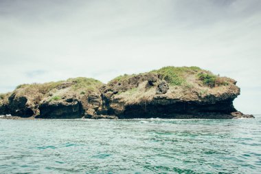 Beautiful rocks on Tanjung Papuma beach, Jember, Indonesia clipart