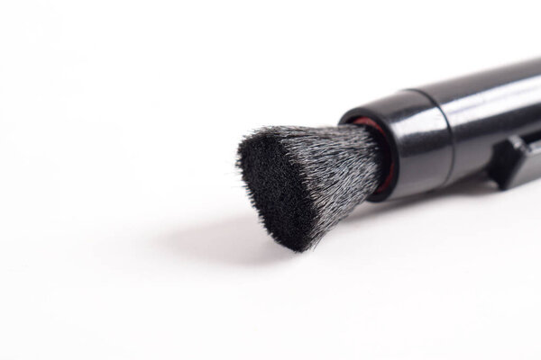 Cleaning brush for camera and electronic isolated on white background