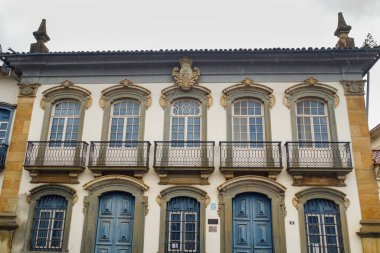 colored facade and porches of ancient building in Mariana, Minas Gerais state in Brazil.