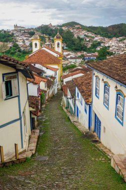 Ouro Preto, MG, Brazil: street slope and ancient buildings of colonial city.