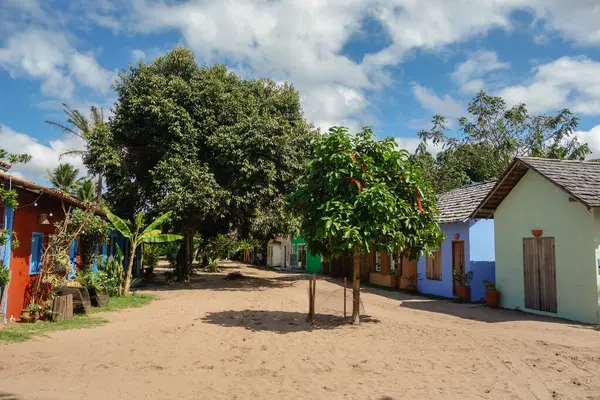 stock image colored houses in Caraiva, coastal and riverside community located in Porto Seguro, Bahia, Brazil.
