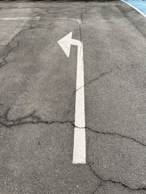 Left arrow on the road