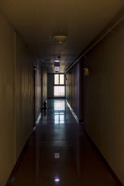 Emergency exit sign at the hallway of building