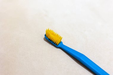 Old toothbrush in bathroom