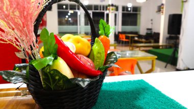 plastic vegetables in the interior of cafe.