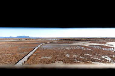 Dedeağaç ve Türkiye sınırı yakınlarındaki Evros Deltası Ulusal Parkı 'nda gün batımı veya gün doğumu, Dadia ormanı ve koruma altındaki sulak arazi.