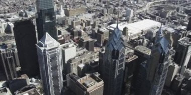 aerial view of towers and buildings, daytime drone camera