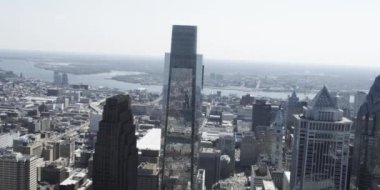 aerial view of towers and buildings, daytime drone camera