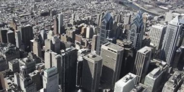 aerial view of towers and buildings, daytime drone camera