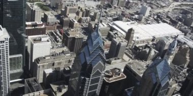 aerial view of towers and buildings, daytime drone camera