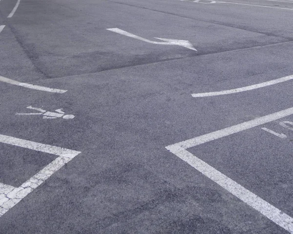 Floor signs on a parking lot